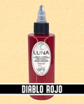 Bottle of Luna Diablo Rojo ink on a beige background