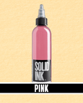 Bottle of pink tattoo ink with 'Solid Ink' branding on a beige background